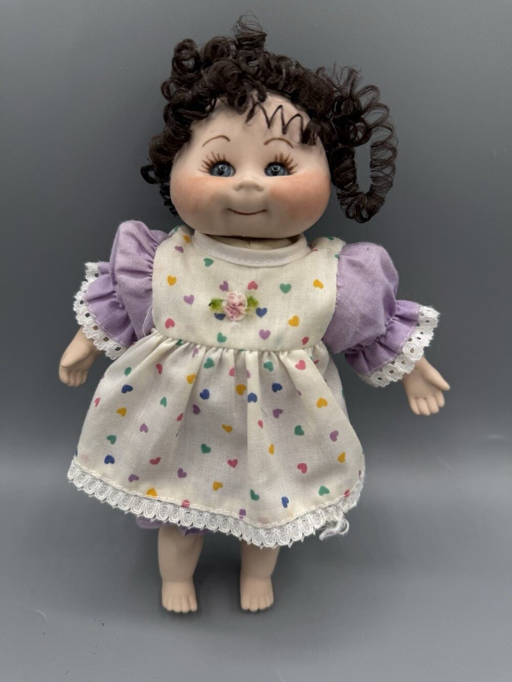Vintage 1983 Butterfly Baby Doll 9” Porcelain Brown Hair Heart Dress